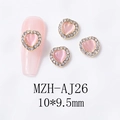Detail of pink cat-eye heart nail charms with rhinestone border on a long nail - Gold Base Pink Opal (AJ26)