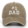 Detailed view of white #1 DAD embroidery on a vintage washed khaki cotton baseball cap - Khaki