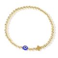 Bracciale a sfere dorate con perla occhio blu e ciondolo a croce in metallo su bianco - Occhio Bianco-Oro (JS-B24070302A)