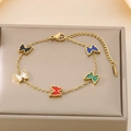 Detailed close-up of a golden butterfly bracelet featuring vibrant multi-color shell charms - Colorful (KB187211-BI)