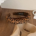 Chic leopard print wide sponge headband in brown with a handmade label detail - Small Leopard Dark Coffee