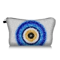 Close-up of portable evil eye makeup bag with blue mosaic pattern and black zipper handle - White Mosaic Evil Eye