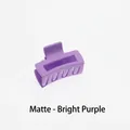 Detail view of the mini 4cm matte bright purple hollow square hair claw clip for women - Matte Bright Purple