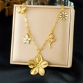 18k gold plated stainless steel necklace featuring butterfly and flower charms on a chain - Gold Style (N3711)