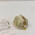 Plaid weave earbuds case featuring gold zipper, pearl charm and yellow carabiner clip - Green