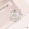 Detail view of vintage zinc alloy dog license charm with 1.7x2cm dimensions and engraved text - C087 17mm*20mm Vintage Silver 5021 Tag