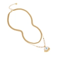 Double-layered gold stainless steel necklace with pearl and evil eye pendant detail - Evil Eye