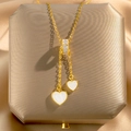 Golden Y-shaped titanium necklace with heart shell pendants and zircon slider buckle - Tassel Heart Pendant
