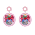 Detail of pink and red Christmas acrylic earrings featuring bow and snow house patterns - No.10 - Pink Snow House