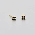 Close-up of four-petal flower stud earrings with black stones and gold-tone base - Gold Color Black Zirconia