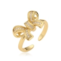 Elegante anello a fiocco dorato con micro zirconi e design a fascia aperta regolabile - Stile CE00842YH / Oro