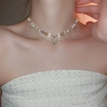 Close-up of double-layer beaded necklace with white pearls and gold heart pendant on neck - 9# Gold Pearl Tassel Hollow Heart Double Layer Style