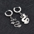 Silver stainless steel huggie earrings featuring a detailed dragon charm with zircon eye - Dragon - Steel