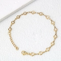 Golden stainless steel chain bracelet with white heart enamel links and lobster clasp - White