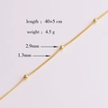 Detail of gold-plated copper chain showing 2.9mm beads and 40+5 cm length specs - Style 5 (1.3mm Bead Station Chain)