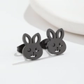 Macro shot of cute matte black rabbit-shaped stud earrings in durable stainless steel - Rabbit Black