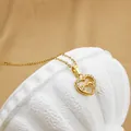 Titanium steel heart necklace in gold finish featuring sparkling zircon nested pendant - No. 5 N0112 Gold