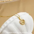 Titanium steel heart necklace in gold finish featuring sparkling zircon nested pendant - No. 5 N0112 Gold