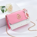Chic pink and white sequined crossbody bag with gold crown logo and pearl bow charm - With Pendant / Pink
