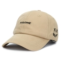 Beige katoenen honkbalpet met zwart borduursel en een smiley-patch aan de zijkant - Verstelbaar / Khaki