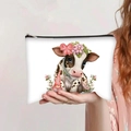 White highland cow makeup bag with pink gnome and floral print, featuring zipper closure - Highland Cow with Gnome (jiayingpbb0101)