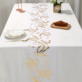 Close-up of white tulle table runner with gold 70th anniversary stars and numbers - 28*275cm / 70th Birthday Gold