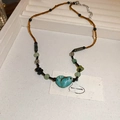 Detail view of vintage beaded necklace with green turquoise heart pendant and lobster clasp - 13# Brown Green Style