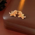 Macro di orecchini a forma di unicorno placcati in oro 18K con cristalli arancioni - Orecchini-Oro-Caffè Chiaro