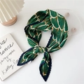 Pleated silk scarf in green and navy blue with gold lines, tied on white background - Blue Border Green Fan Pattern