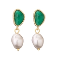 Detail view of gold-plated earrings with green faceted stone and baroque pearl drops - Dark Green