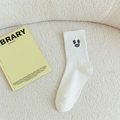White cotton crew socks with quirky dollar sign eye embroidery on soft fleece texture - Money Seeker / White (Money Seeker)