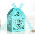 Detail of Tiffany blue hollow heart candy box with organza ribbon on white background - Tiffany Blue