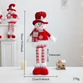 Detail view of telescopic Christmas snowman plush with dimension tags and holiday decor - Red Telescopic Snowman