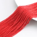 Close-up of red faceted crystal glass beads strings displayed on a white plate - 1MM String Approx 190pcs (Actual Size 2MM) / Porcelain Red