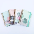 Set of four pastel A6 spiral notebooks with artistic lifestyle illustrations and elastic bands - Slow Life Pattern - 4 Pack
