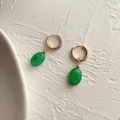Detail of French vintage gold earrings with oval green natural stone pendants - Green Jade Oval Gold