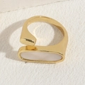 Golden open ring with oval white shell inlay and zircon in a geometric heart style - Rectangular Shell