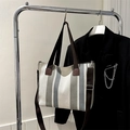 Striped canvas tote bag in grey and beige with adjustable shoulder straps and brown handles - Gray