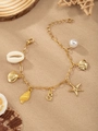 Golden ocean charm bracelet with white seashells, starfish, and pearls for summer beach wear - Letter S(S)