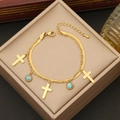Collana doppia dorata con croce e pietre turchesi in una confezione regalo - Bracciale