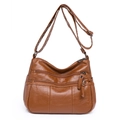 Brown PU leather crossbody bag with multiple zip pockets and adjustable strap - Tan