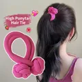 Rose pink woven double-knot hair tie for high ponytails shown on a model - Rose Red