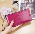Glossy rose red long wallet for women with zipper closure and detachable wristlet strap - Magenta