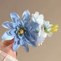 Handmade blue mesh flower hair clip with velvet petals and elegant floral accents - Blue Rose Hair Clip