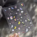 Macro shot of 3D embossed nail stickers featuring rainbow smiles and clouds on fingers - Rainbow Mood Smile Face (to529)