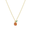 Macro shot of a minimalist gold apple pendant necklace with orange and green crystals - Gold Blood Orange Necklace