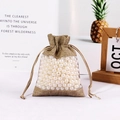 Linen drawstring jewelry bag with clear window and white pearls inside for storage - Natural Hemp