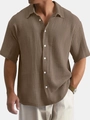 Close-up of deep coffee short sleeve shirt showing detailed cotton linen ripple texture - Coffee