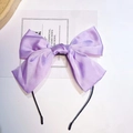 Elegant purple satin bow headband with thin black band shown on a minimal white background - Purple (Headband)