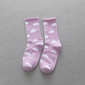 Lavender purple crew socks featuring white cloud patterns and ribbed cuffs for women - One Size / Purple